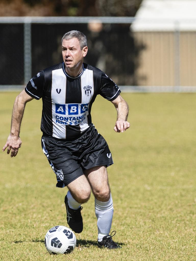 Scott May looks for options for Willowburn against Dalby Tigers in Div 2 Men FQ Darling Downs Presidents Cup football at West Wanderers, Sunday, July 24, 2022. Picture: Kevin Farmer