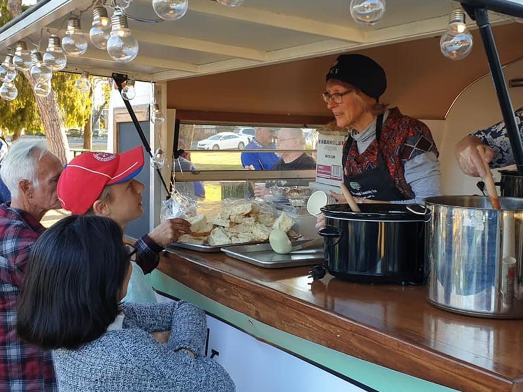 Warwick Community Van volunteer serves up.