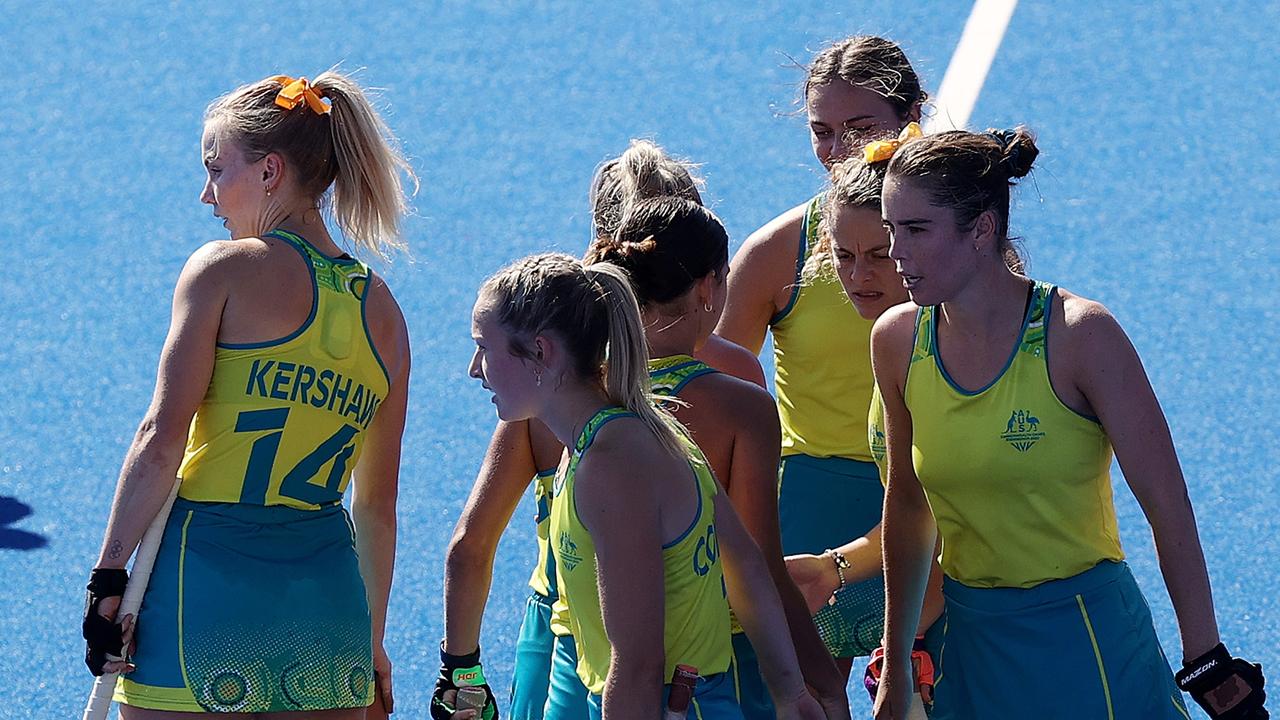 A disconsolate Australian team after their loss to England. Picture: Dean Mouhtaropoulos/Getty Images