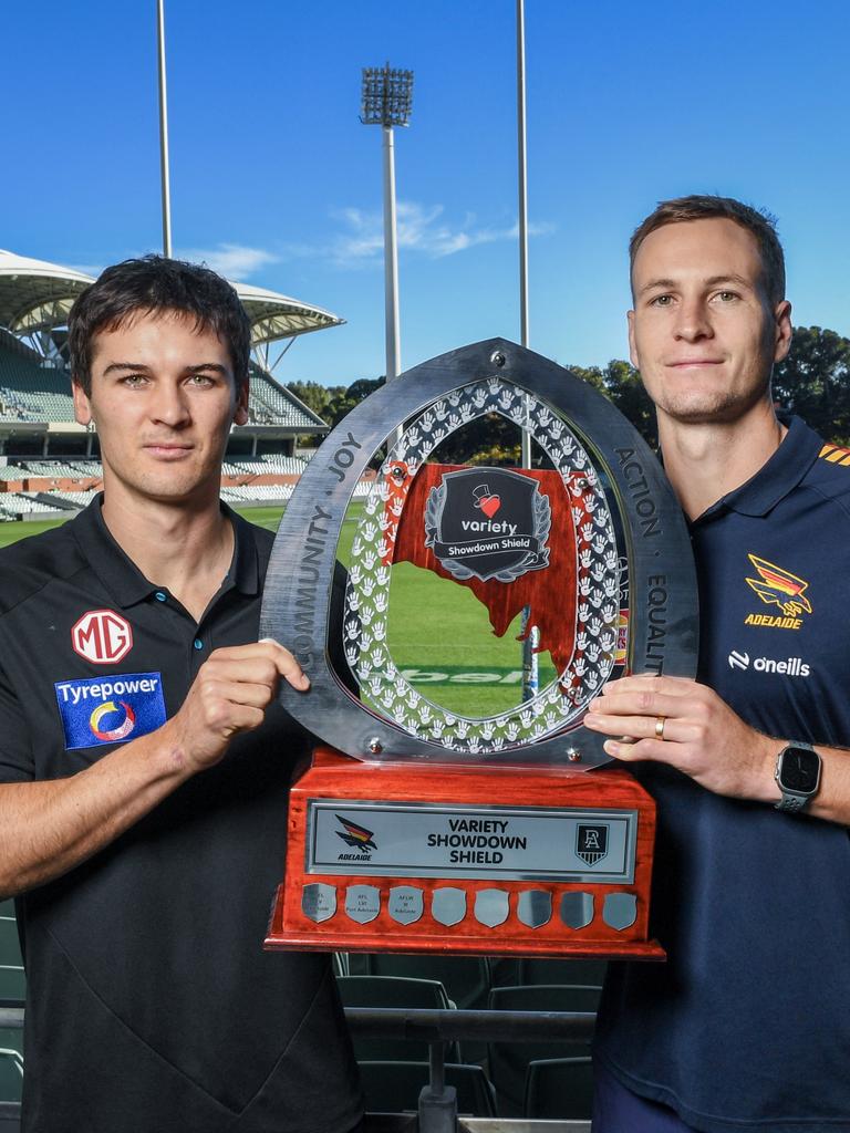 Port’s Conor Rozee and Adelaide’s Jordan Dawson with the Showdown Shield. (Photo by Mark Brake/Getty Images)