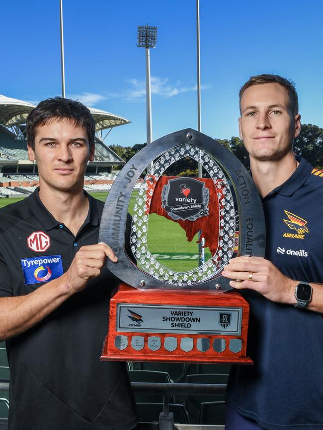 Port’s Conor Rozee and Adelaide’s Jordan Dawson with the Showdown Shield. (Photo by Mark Brake/Getty Images)