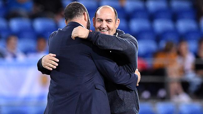 Pumas coach Mario Ledesma embraces Wallabies coach Michael Cheika prior to kick-off.