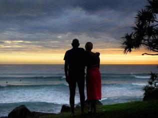 22/3/11   BSM - A young couple enjoy the sunrise at the world famous Burleigh Headland. Pic by Luke Marsden.