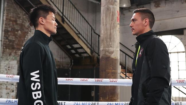 Takeshi Inoue and Tim Tszyu face off ahead of their fight on Wednesday night. Picture: Mark Metcalfe/Getty Images