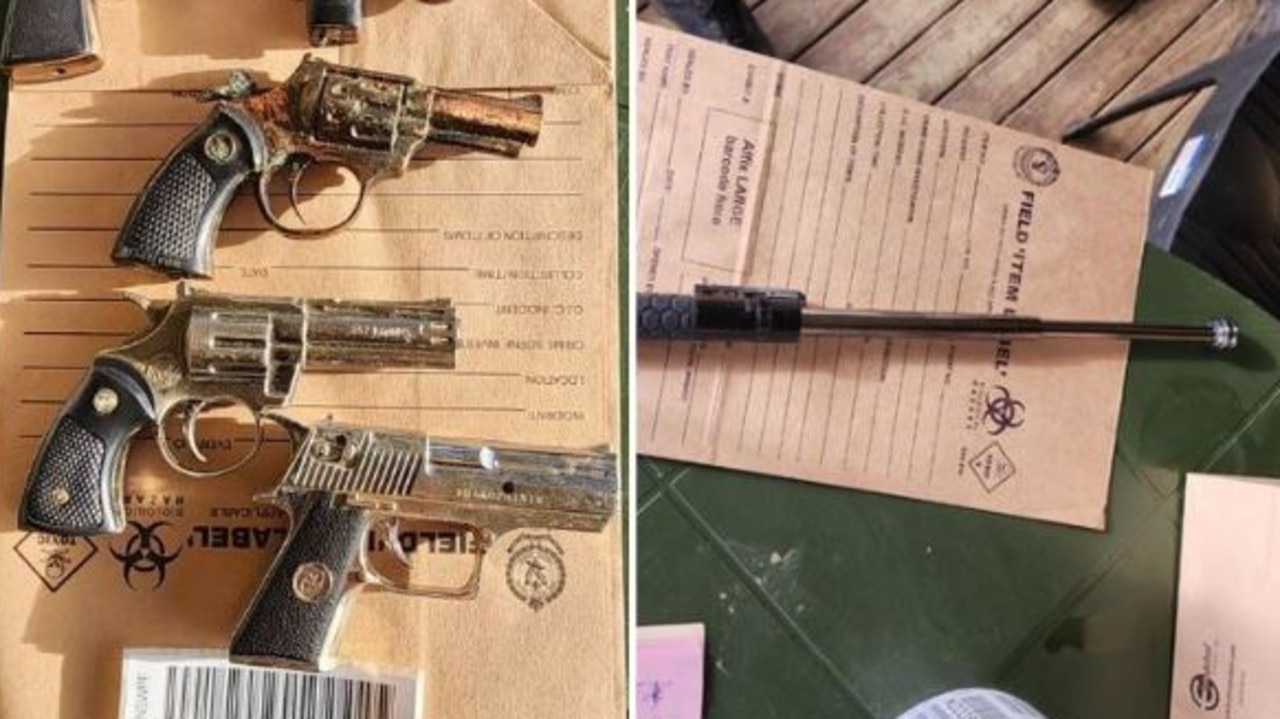Man nabbed with alleged stash of guns, drugs walks