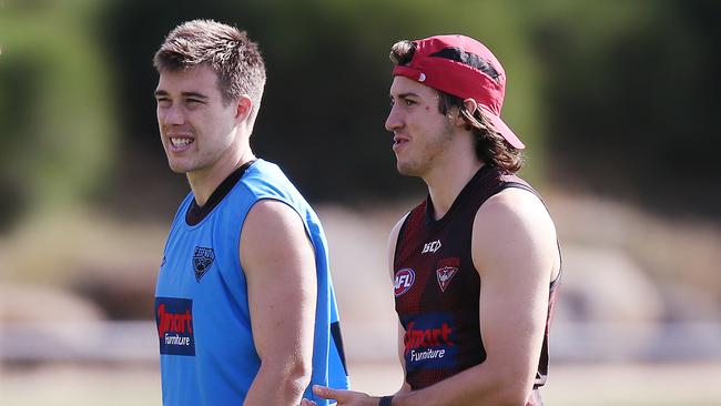 Zach Merrett, left, with Andrew McGrath at Essendon training.