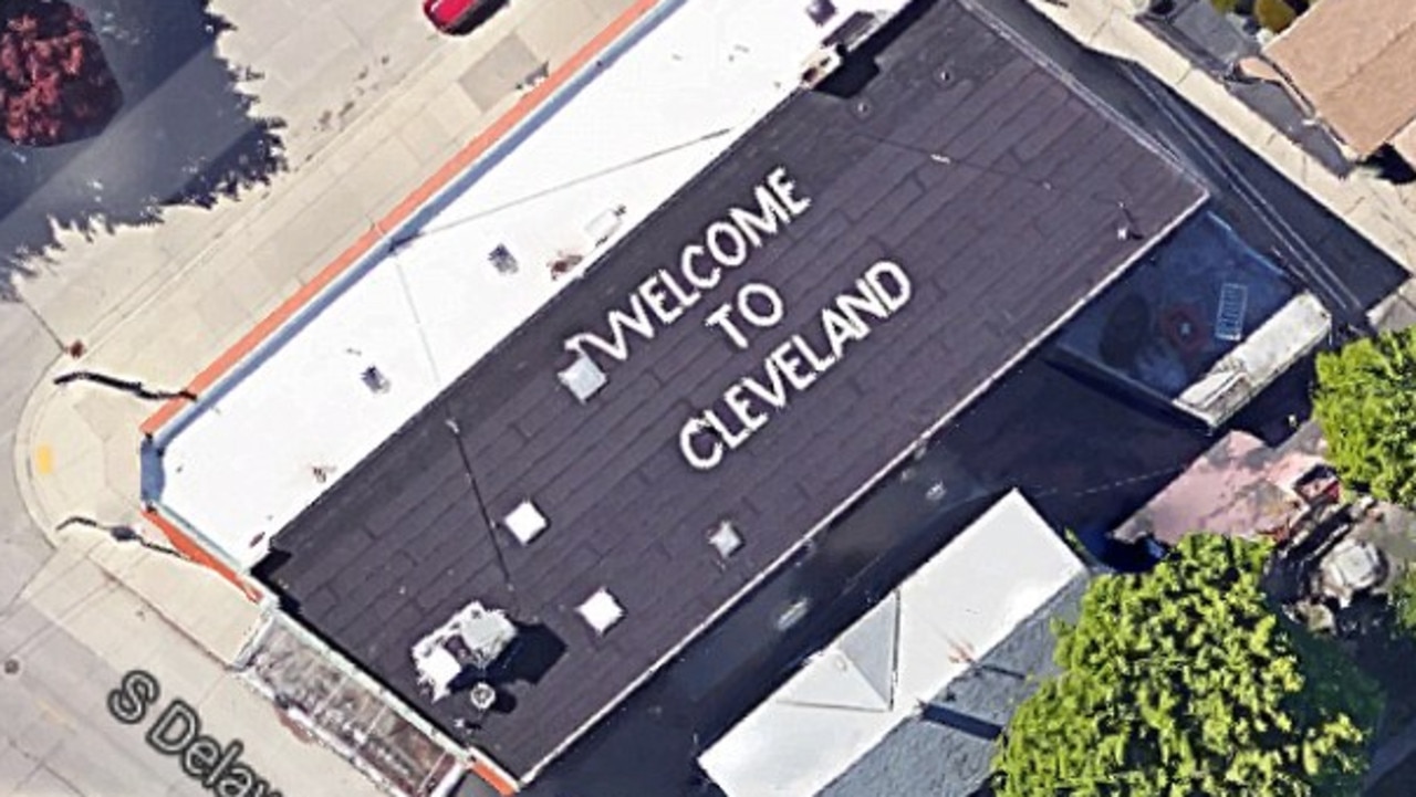 The famous 'Welcome to Cleveland' sign on a house in Milwaukee has been fooling passengers for decades.