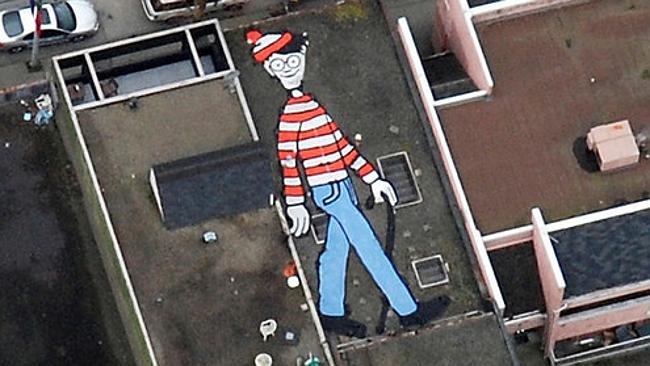 Where's Wally? Well, it's actually kind of obvious. Canadian artist Melanie Coles built this image in Vancouver.