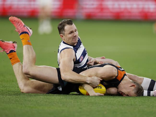 MELBOURNE, AUSTRALIAÃ June 21 , 2024.  AFL Round 15. Carlton vs Geelong at the MCG.   Sam Walsh of the Blues  gets tackled into the turf by Patrick Dangerfield of the Cats during the 1st qtr.     . Pic: Michael Klein