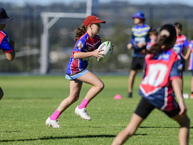 Libby Miller on the move for Highfields State School in the inaugural Primary Interschools Reconciliation Touch Carnival hosted by Glenvale State School, Wednesday, May 28, 2025. Picture: Kevin Farmer