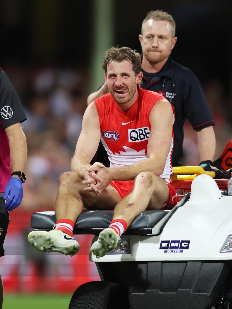 Cunningham was helped from the field. (Photo by Mark Metcalfe/AFL Photos/via Getty Images )