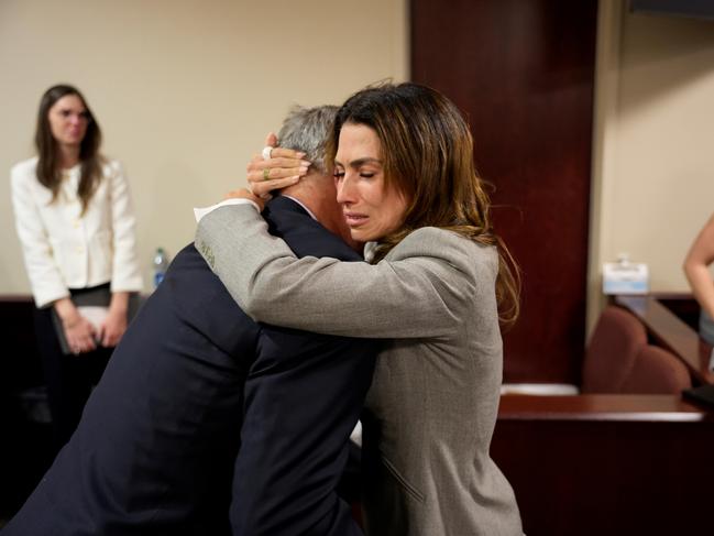 Alec Baldwin and his wife Hilaria Baldwin embrace after his trial ended. Picture: Getty Images