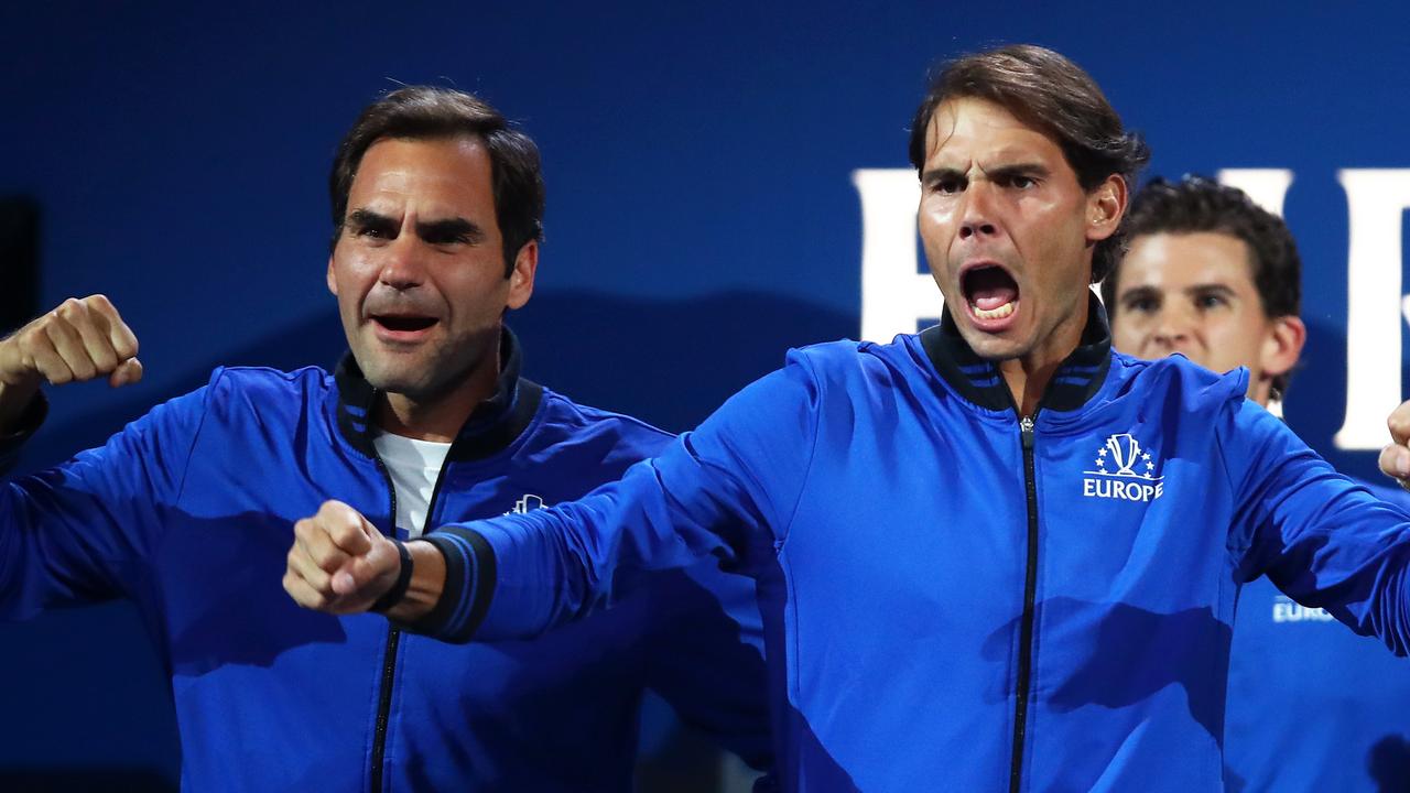 GENEVA, SWITZERLAND - SEPTEMBER 20: Rafael Nadal of Team Europe and teammate Roger Federer celebrate during the singles match between Stefanos Tsitsipas of Team Europe and Taylor Fritz of Team World during Day One of the Laver Cup 2019 at Palexpo on September 20, 2019 in Geneva, Switzerland. The Laver Cup will see six players from the rest of the World competing against their counterparts from Europe. Team World is captained by John McEnroe and Team Europe is captained by Bjorn Borg. The tournament runs from September 20-22. (Photo by Julian Finney/Getty Images for Laver Cup)