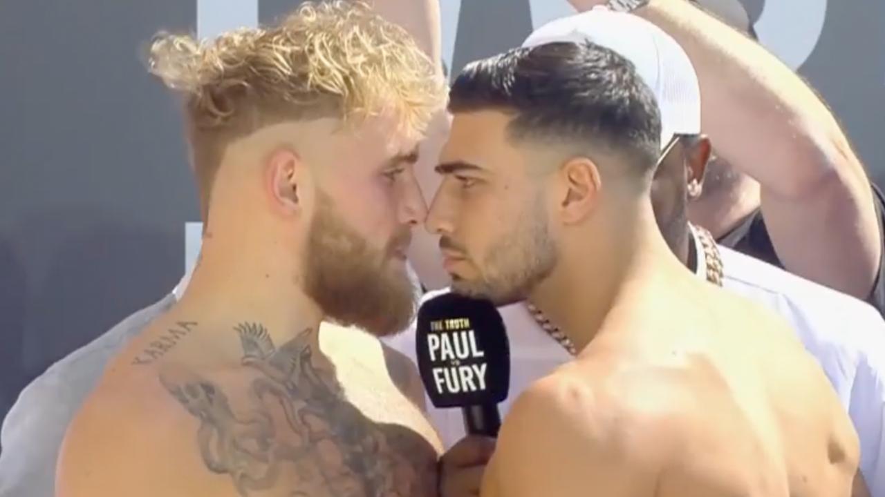Jake Paul and Tommy Fury face off at the weigh-in. Picture: Supplied
