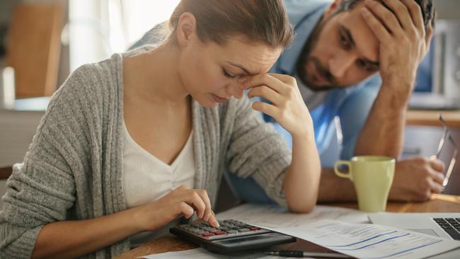 Photo of a couple going through financials problems