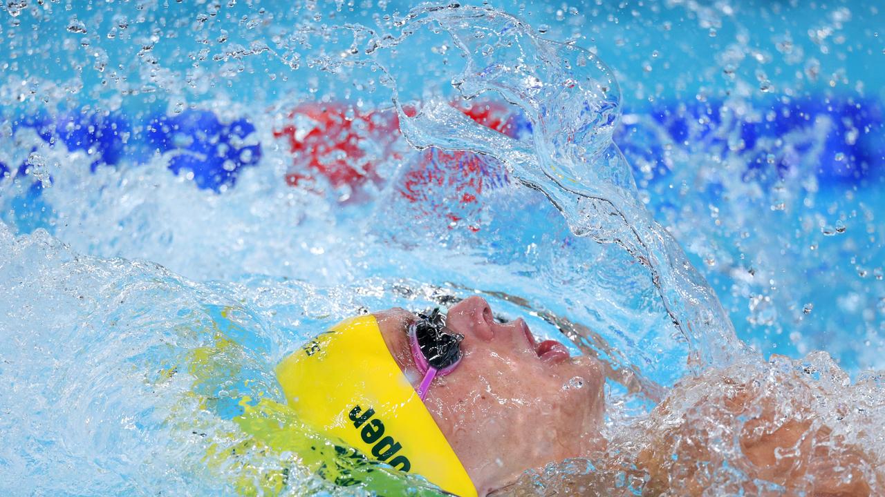 Isaac Cooper competes in the men’s backstroke.