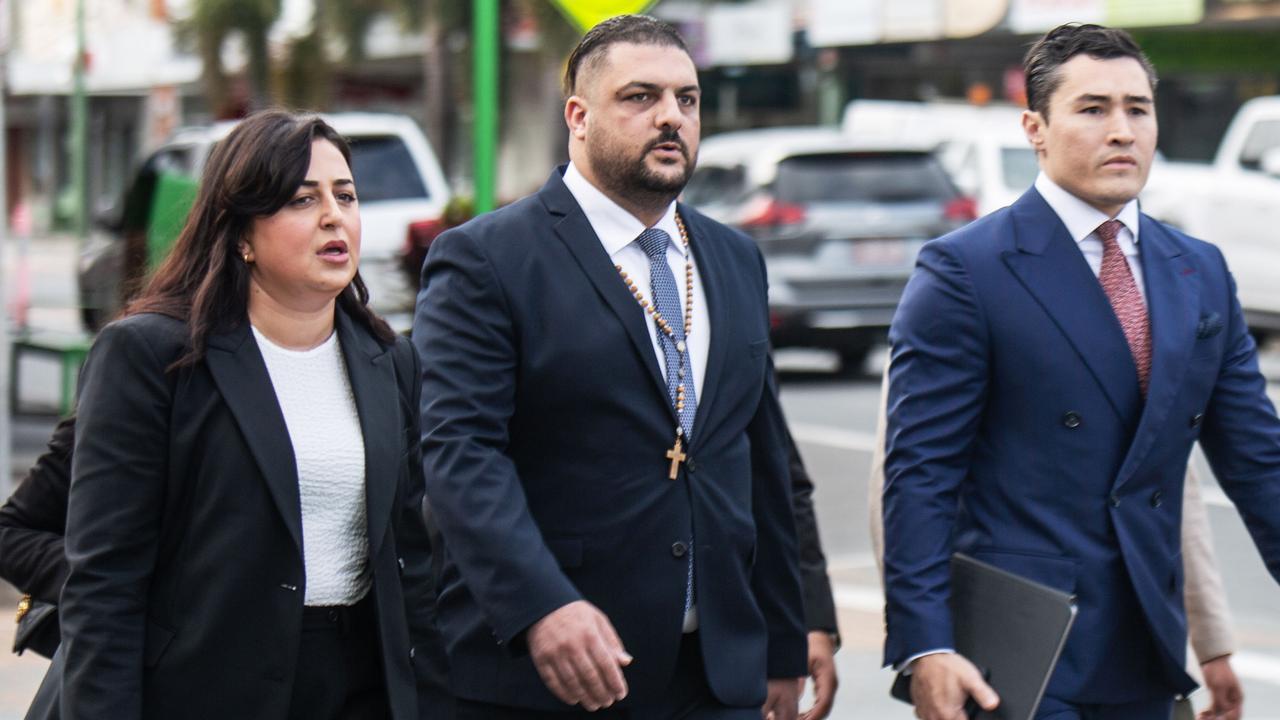 Robbie Morgan (also goes by Robbie Awad), middle, arrives at Proserpine Court. Picture: Andrew Pattinson