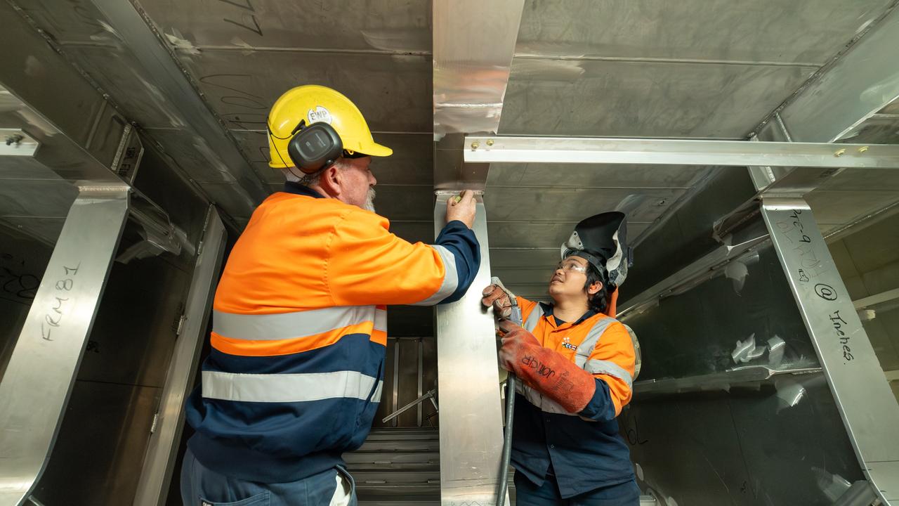 Incat four day week workers welding team leader Tim Petrie and welder Jomar Villamor Tagan-Na.