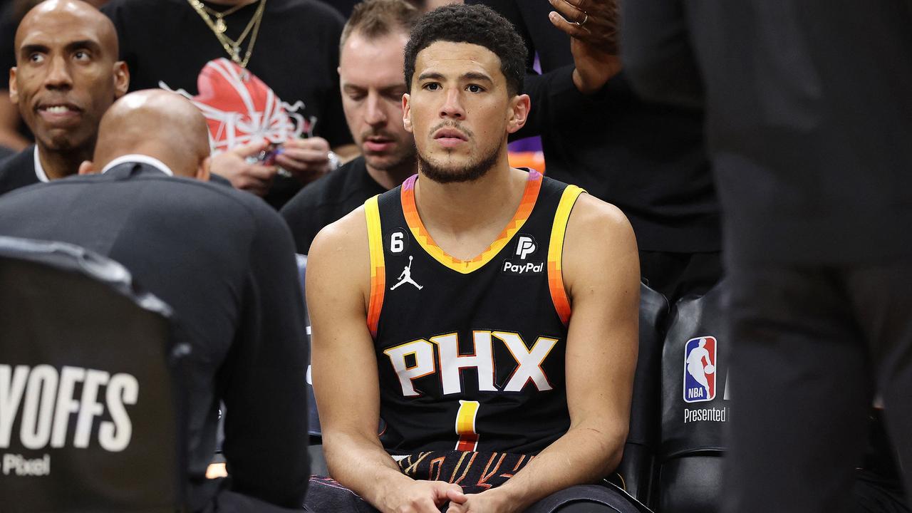 PHOENIX, ARIZONA - MAY 11: Devin Booker #1 of the Phoenix Suns reacts during a timeout in the fourth quarter against the Denver Nuggets in game six of the Western Conference Semifinal Playoffs at Footprint Center on May 11, 2023 in Phoenix, Arizona. NOTE TO USER: User expressly acknowledges and agrees that, by downloading and or using this photograph, User is consenting to the terms and conditions of the Getty Images License Agreement. Christian Petersen/Getty Images/AFP (Photo by Christian Petersen / GETTY IMAGES NORTH AMERICA / Getty Images via AFP)