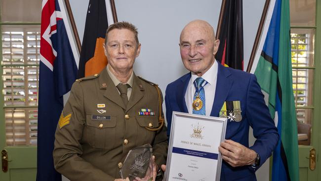 Administrator of the Northern Territory, His Honour Professor the Honourable Hugh Heggie PSM presents The Prince of Wales Award to Sergeant Pamela Dillon. Picture: Supplied.