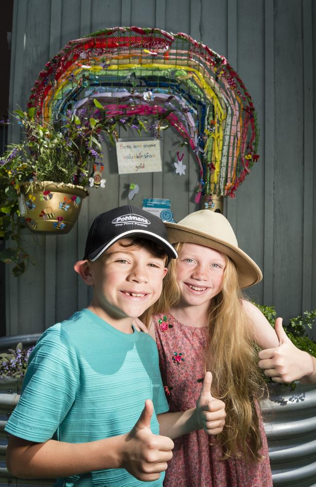 Toowoomba East State School students Henry and Matilda McGaw. The school won the P-Yr12 category winner of Cobb and Co Hanging Basket Display of Toowoomba's Carnival of Flowers. Picture: Kevin Farmer