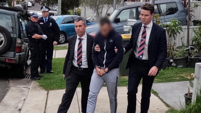 Three men who allegedly held two young girls at gunpoint during a violent series of crimes across the city have been arrested by police. Picture: NSW Police