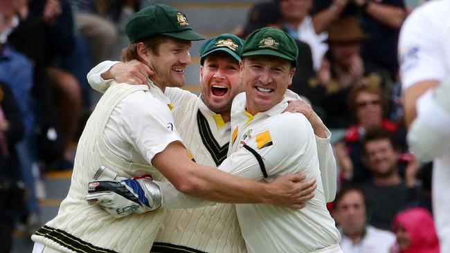 9.12.2013 - Ashes 2nd Test, Australia v England, Adelaide Oval - Day 5. Michael Clarke and the Australian team mates Shane Watson and Brad Haddin celebrate after the last wicket of Monty Panesar falls - bowled Ryan Harris. PIC SARAH REED.