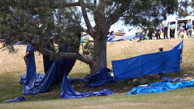 Police erected privacy screens as they responded to the jumping castle tragedy at Hillcrest Primary School in Devonport on December 16, 2021. Picture: ABC News