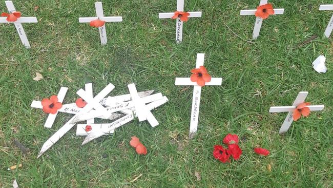 Dozens of memorial crosses at the RSL's Field of Remembrance near the National War Memorial on North Terrace have been vandalised in the lead-up to Remembrance Day. Picture: Supplied