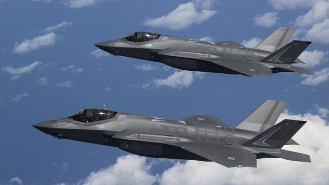 F-35A Lightning II Joint Strike Fighters A35-001 (closest) and A35-002. “We’re confident that the F-35 capability that we’re fielding right now — stealth, sensors and sensor fusion — are at least a decade, even more, beyond the capabilities of the adversaries,” says Steve Over, Lockheed Martin’s director of international business development. Picture: Defence