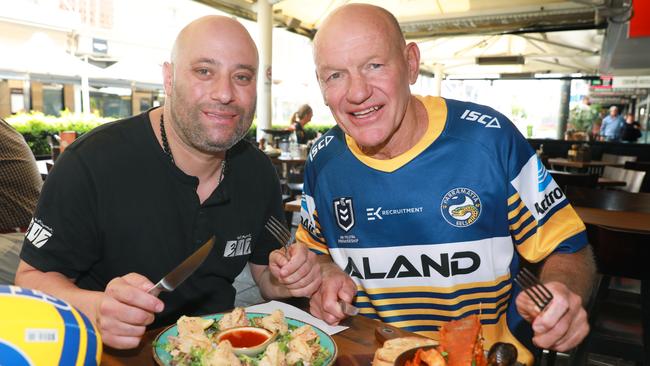 Pierre Sande and Peter Wynn were eager for the crowds to return to Bankwest Stadium and help the struggling Church St restaurants before the coronavirus struck. Picture: Angelo Velardo