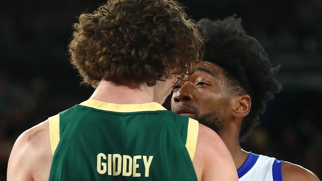 Giddey even got caught in a scrap with a Venezuelan opponent. (Photo by Graham Denholm/Getty Images)