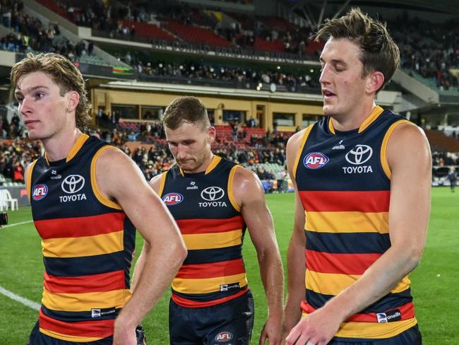 ADELAIDE, AUSTRALIA - APRIL 19: Crows head off the ground after  their loss  during the round six AFL match between Adelaide Crows and Essendon Bombers at Adelaide Oval, on April 19, 2024, in Adelaide, Australia. (Photo by Mark Brake/Getty Images)