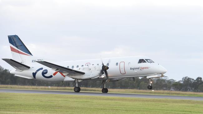 REX plane takes off from a regional airport