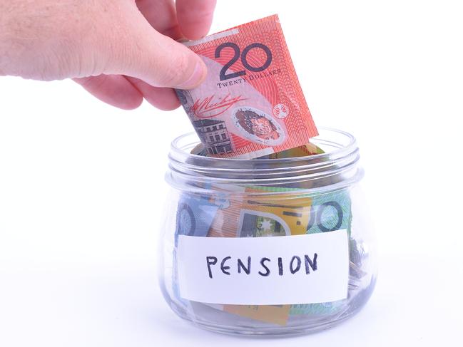 A glass jar full of Australian money, pension, generic