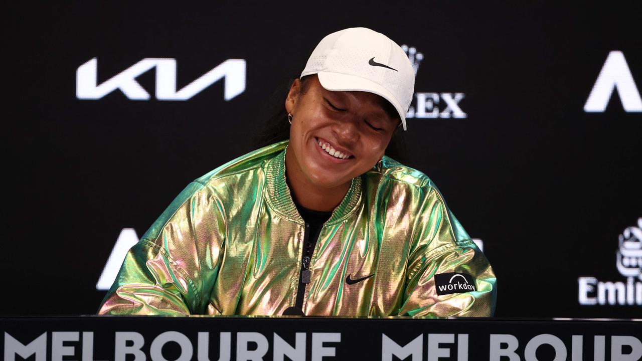 Japan's Naomi Osaka is all smiles despite her first-round defeat. Picture: AFP