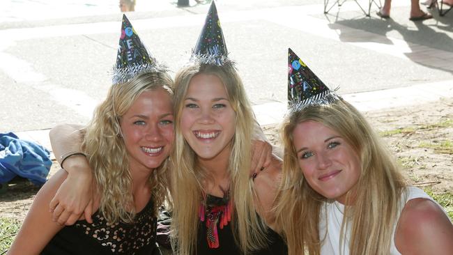 Revellers at last year’s fireworks display at Manly Cove. L-R: My Bloomberg 20, Lilly Ek 20 and Caroline Georgsson 22. Picture: Manly Daily