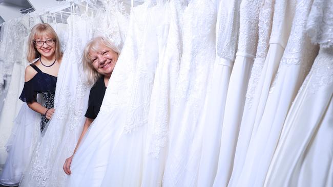 Mary and Rosa showing off their gowns. Photo: Scott Powick News Corp