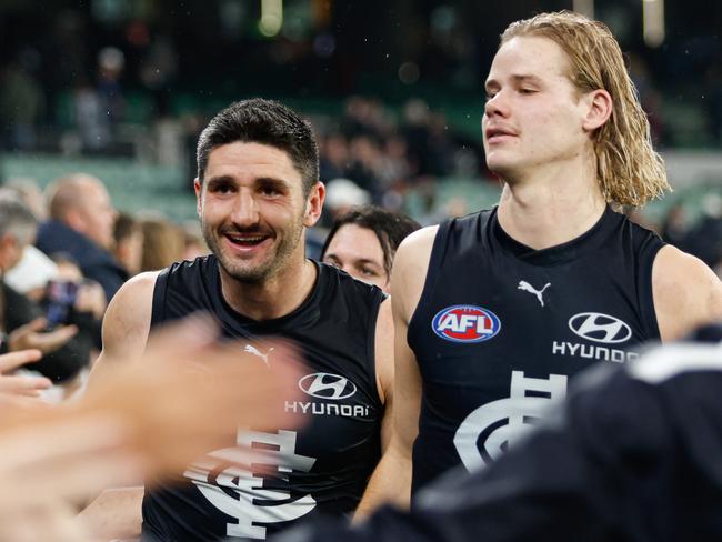 MELBOURNE, AUSTRALIA – MAY 09: Marc Pittonet of the Blues celebrates during the 2024 AFL Round 09 match between the Carlton Blues and the Melbourne Demons at The Melbourne Cricket Ground on May 09, 2024 in Melbourne, Australia. (Photo by Dylan Burns/AFL Photos via Getty Images)