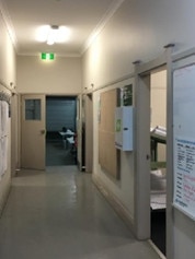 Inside Auburn ambulance station. Left: the central entrance hall and (right) the hall towards the ambulance bays at the back.