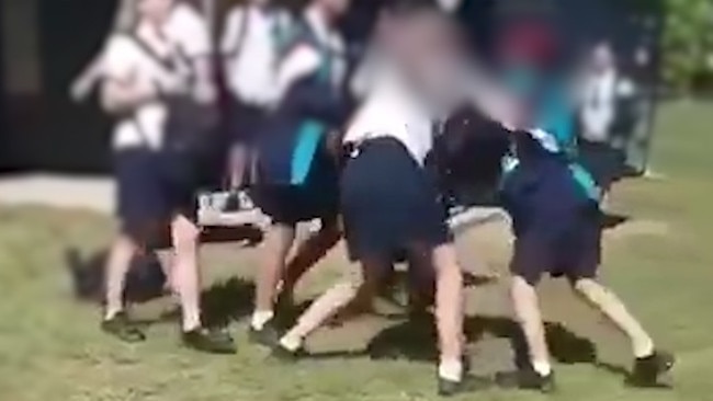 Screen grabs from schoolyard fight caught on video.