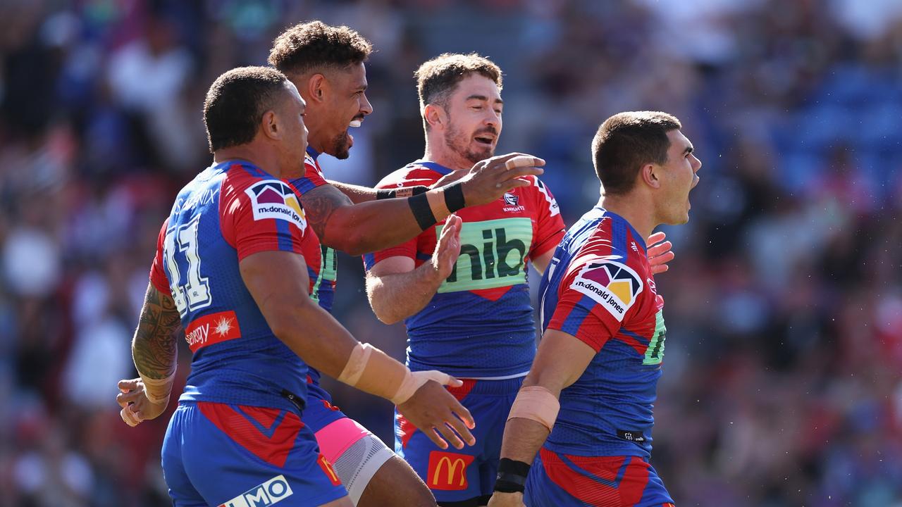 NEWCASTLE, AUSTRALIA - MARCH 20: Jake Clifford of the Knights celebrates scoring a try during the round two NRL match between the Newcastle Knights and the Wests Tigers at McDonald Jones Stadium, on March 20, 2022, in Newcastle, Australia. (Photo by Cameron Spencer/Getty Images)