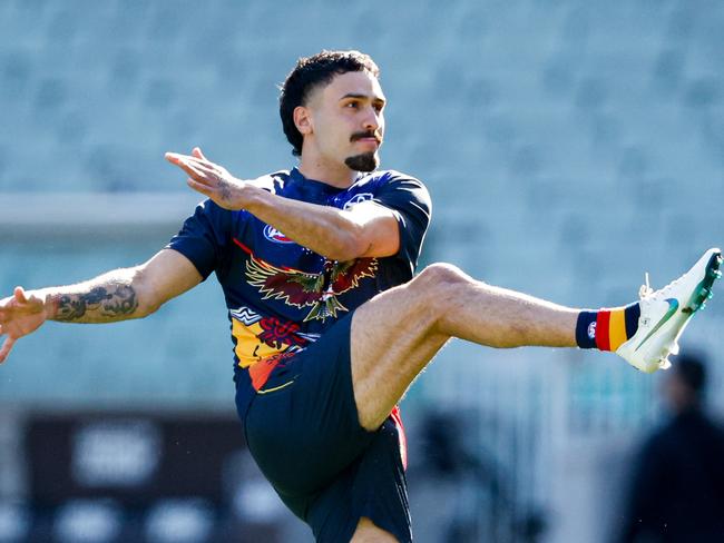 MELBOURNE, AUSTRALIA - MAY 18: Izak Rankine of the Crows warms up before the 2024 AFL Round 10 match between The Collingwood Magpies and Kuwarna (Adelaide Crows) at The Melbourne Cricket Ground on May 18, 2024 in Melbourne, Australia. (Photo by Dylan Burns/AFL Photos via Getty Images)