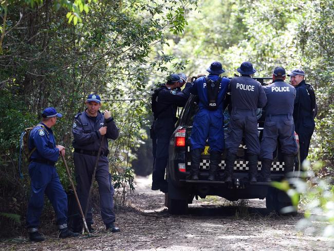 Police search for evidence near Bonny Hills in March last year / Picture: AAP