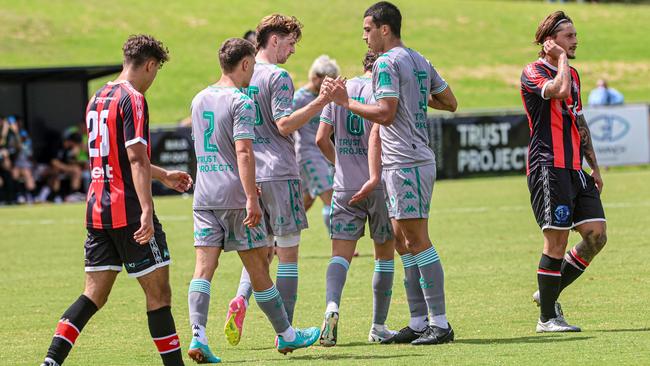 Green Gully in action against Altona Magic.