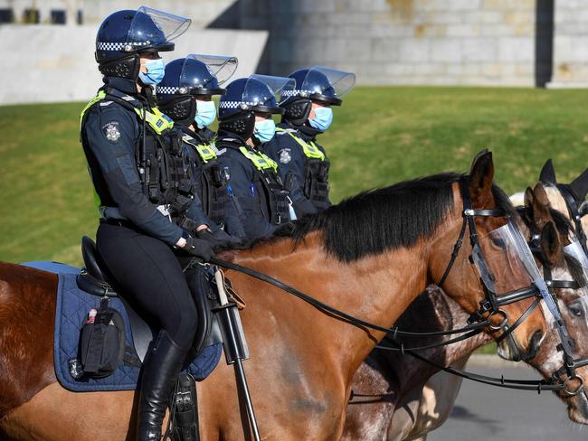 Police on horseback patrol The Shrine of Remembrance in Melbourne. Picture: AFP