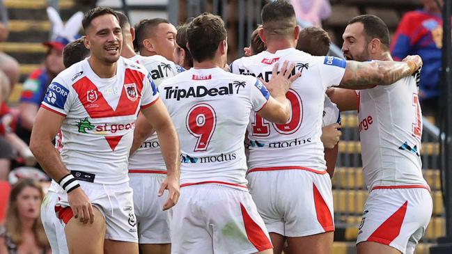 Dragons players celebrate a try during the round four NRL match between the Newcastle Knights and the St George Illawarra Dragons at McDonald Jones Stadium (Photo by Ashley Feder/Getty Images)