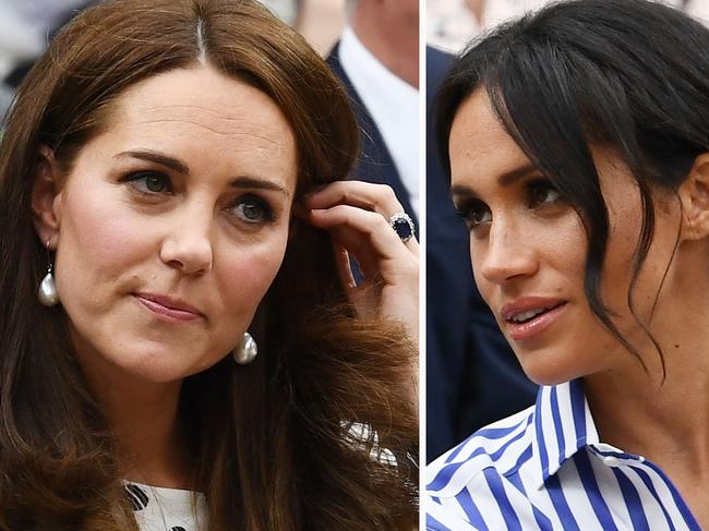 LONDON, ENGLAND - JULY 14:  Catherine, Duchess of Cambridge and Meghan, Duchess of Sussex attend day twelve of the Wimbledon Lawn Tennis Championships at All England Lawn Tennis and Croquet Club on July 14, 2018 in London, England.  (Photo by Clive Mason/Getty Images)