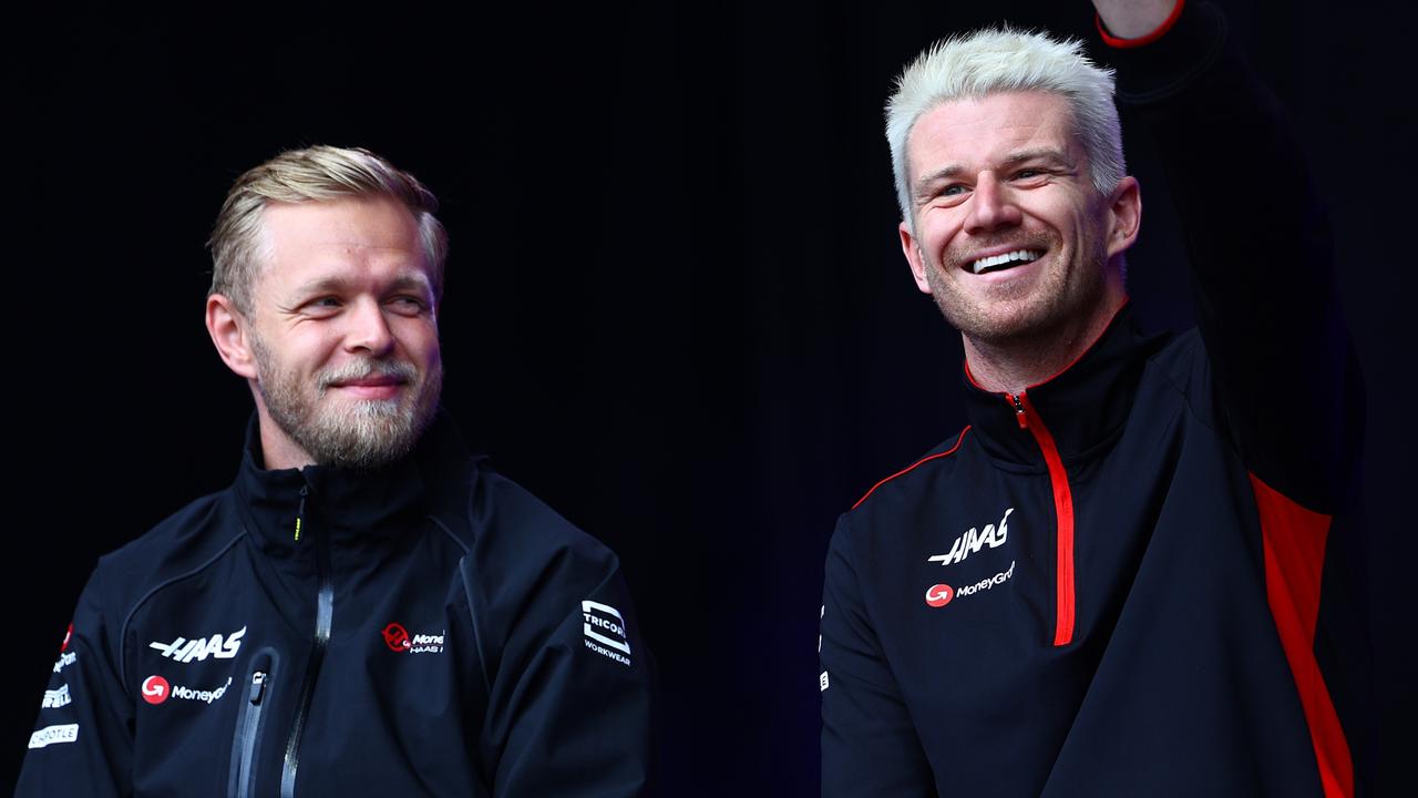 SPA, BELGIUM - JULY 29: Kevin Magnussen of Denmark and Haas F1 and Nico Hulkenberg of Germany and Haas F1 talk to the crowd on the fan stage prior to the Sprint Shootout ahead of the F1 Grand Prix of Belgium at Circuit de Spa-Francorchamps on July 29, 2023 in Spa, Belgium. (Photo by Mark Thompson/Getty Images)