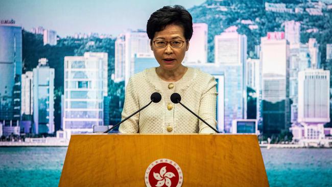 Hong Kong chief executive Carrie Lam discusses the national security law at her weekly press conference in Hong Kong on Tuesday. Picture: AFP